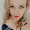 Woman with blonde hair and blue eyes