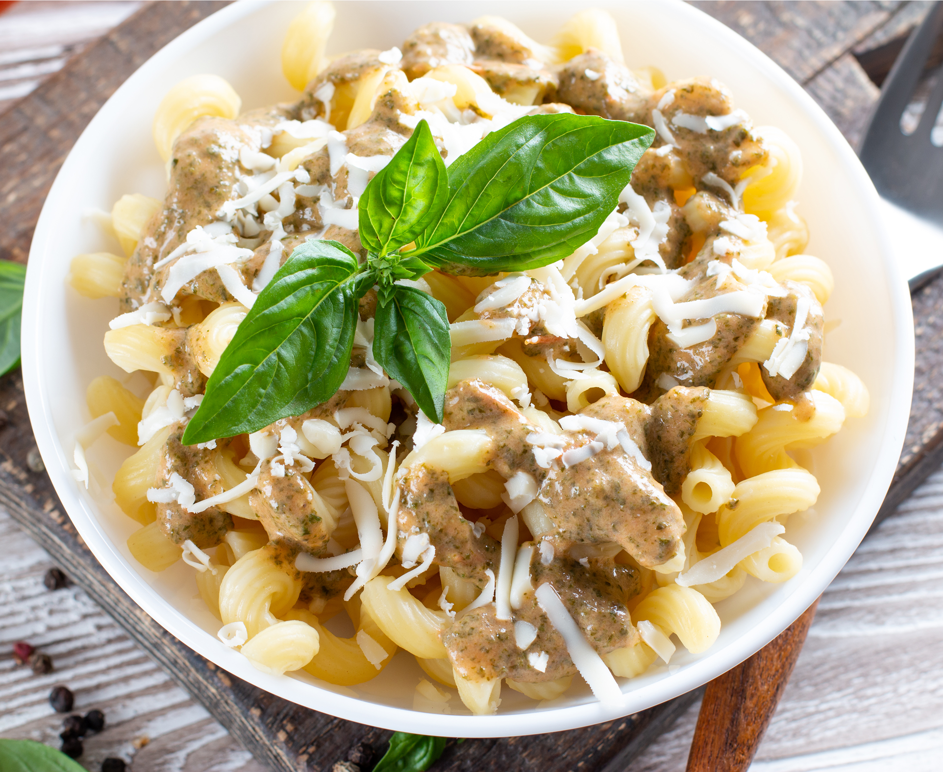 Creamy pasta with basil garnish