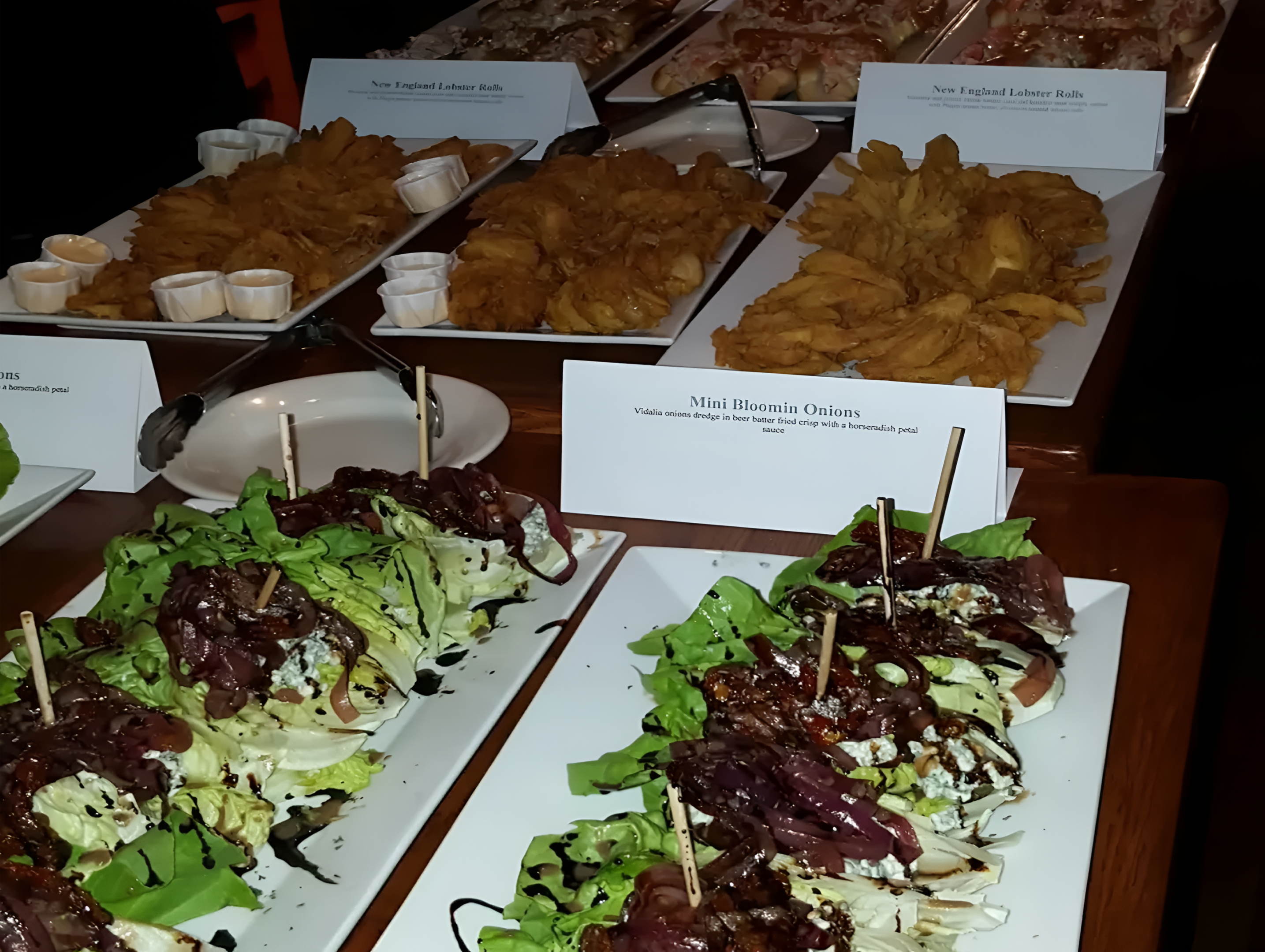 Appetizers displayed on platters at a buffet